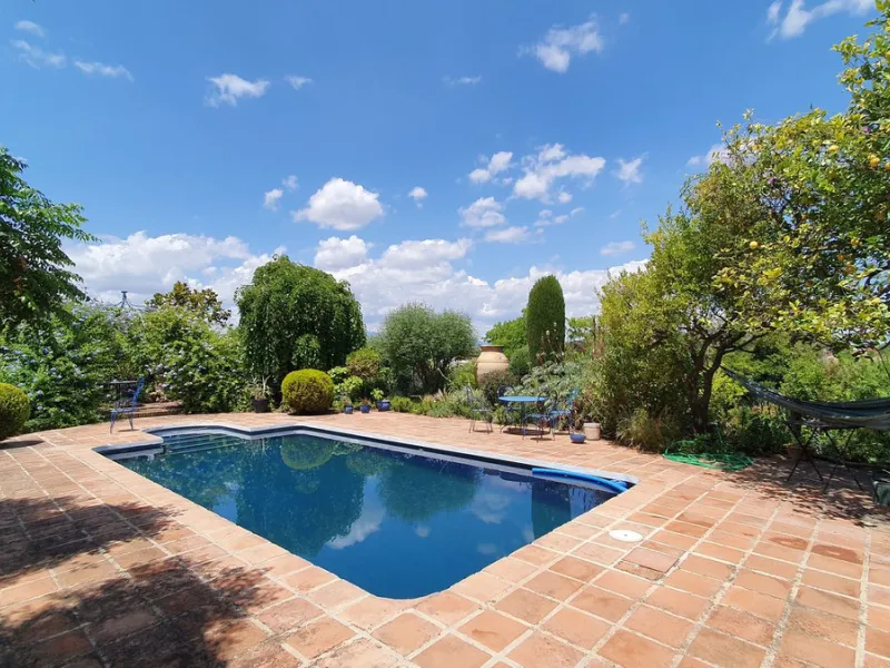 Charming Country Property for sale featuring two houses and two apartments, along with two swimming pools. This property holds a licence for rural tourism and is conveniently located very close to the town, surrounded by a fence ensuring privacy and secur
