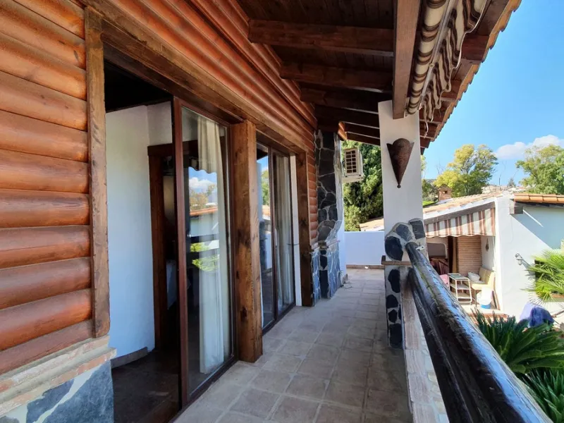 Charming Country Property for sale featuring two houses and two apartments, along with two swimming pools. This property holds a licence for rural tourism and is conveniently located very close to the town, surrounded by a fence ensuring privacy and secur