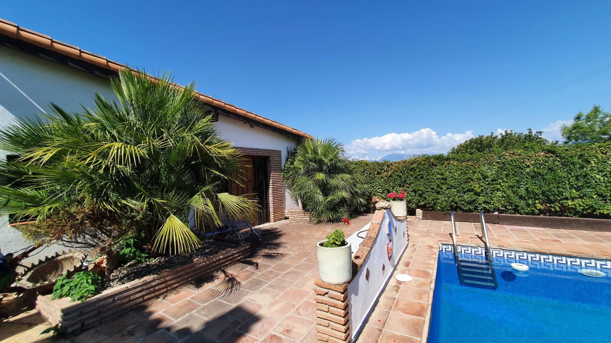 Charming Country Property for sale featuring two houses and two apartments, along with two swimming pools. This property holds a licence for rural tourism and is conveniently located very close to the town, surrounded by a fence ensuring privacy and secur