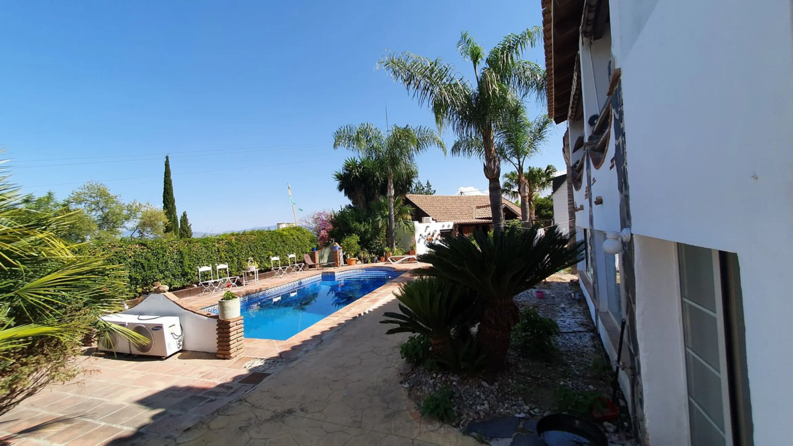 Charming Country Property for sale featuring two houses and two apartments, along with two swimming pools. This property holds a licence for rural tourism and is conveniently located very close to the town, surrounded by a fence ensuring privacy and secur