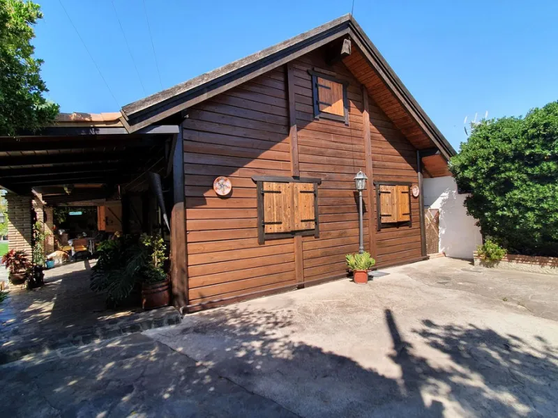 Charming Country Property for sale featuring two houses and two apartments, along with two swimming pools. This property holds a licence for rural tourism and is conveniently located very close to the town, surrounded by a fence ensuring privacy and secur