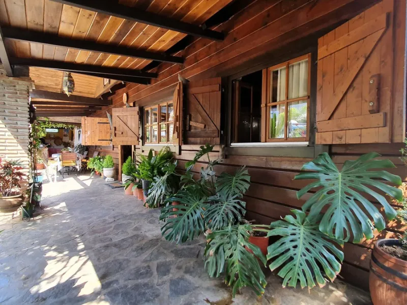 Charming Country Property for sale featuring two houses and two apartments, along with two swimming pools. This property holds a licence for rural tourism and is conveniently located very close to the town, surrounded by a fence ensuring privacy and secur