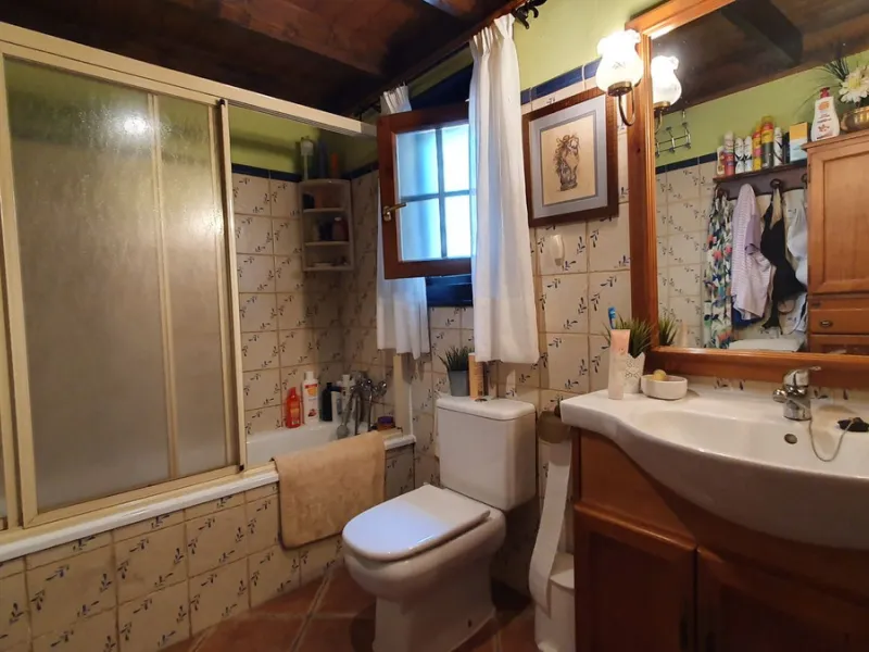 Charming Country Property for sale featuring two houses and two apartments, along with two swimming pools. This property holds a licence for rural tourism and is conveniently located very close to the town, surrounded by a fence ensuring privacy and secur
