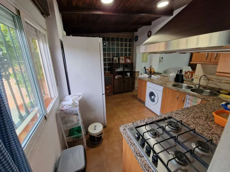 Rural property for sale in Alhaurín de la Torre with a tourist license located in the Romeral area on a 3000m2 plot, with 3 independent houses, swimming pool and gardens shared between the homes.