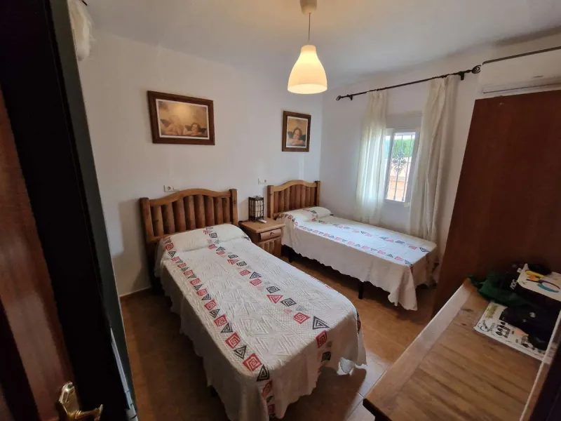 Rural property for sale in Alhaurín de la Torre with a tourist license located in the Romeral area on a 3000m2 plot, with 3 independent houses, swimming pool and gardens shared between the homes.