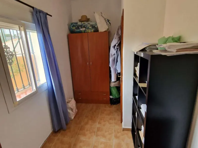Rural property for sale in Alhaurín de la Torre with a tourist license located in the Romeral area on a 3000m2 plot, with 3 independent houses, swimming pool and gardens shared between the homes.