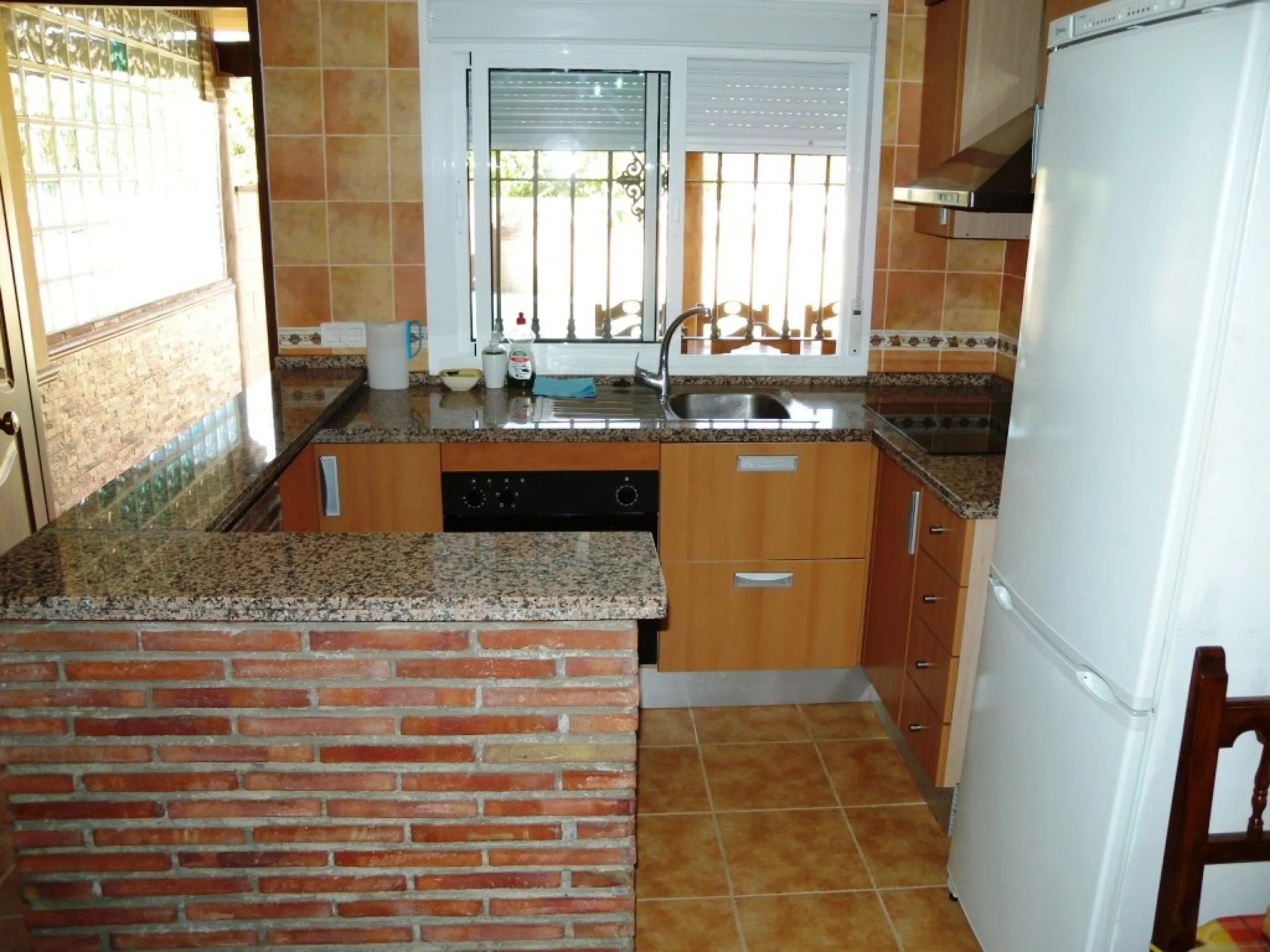 Rural property for sale in Alhaurín de la Torre with a tourist license located in the Romeral area on a 3000m2 plot, with 3 independent houses, swimming pool and gardens shared between the homes.