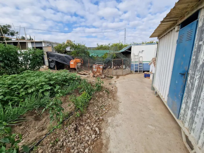 Rural property for sale in Alhaurín de la Torre with a tourist license located in the Romeral area on a 3000m2 plot, with 3 independent houses, swimming pool and gardens shared between the homes.