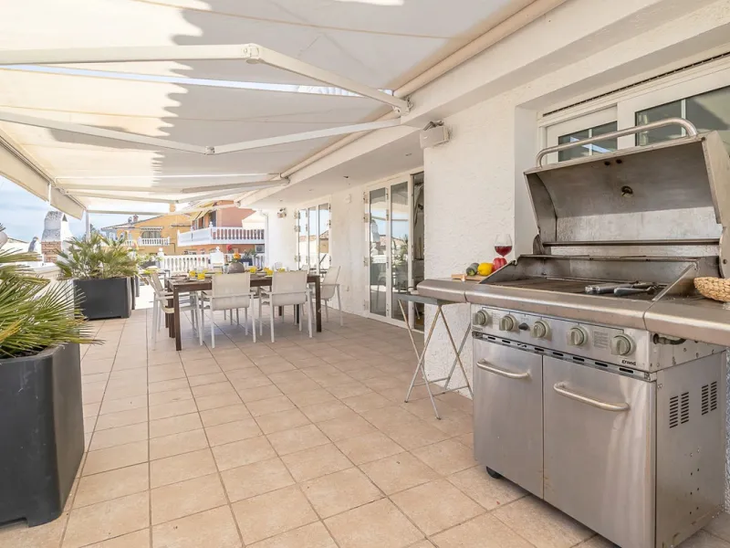 Nestled in the Urb. Torrenueva, Mijas Costa, this enchanting, six-bedroom villa, divided over two floors, epitomizes charm and elegance. Ideal for rental purposes to produce ROI or as a two family home. (Tourist Rental Licence in place). Located in the pi