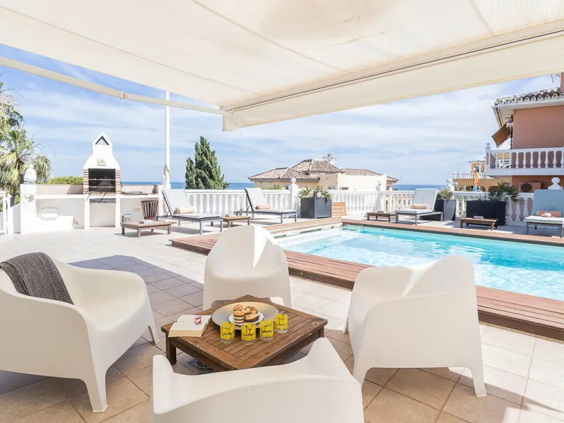 Nestled in the Urb. Torrenueva, Mijas Costa, this enchanting, six-bedroom villa, divided over two floors, epitomizes charm and elegance. Ideal for rental purposes to produce ROI or as a two family home. (Tourist Rental Licence in place). Located in the pi