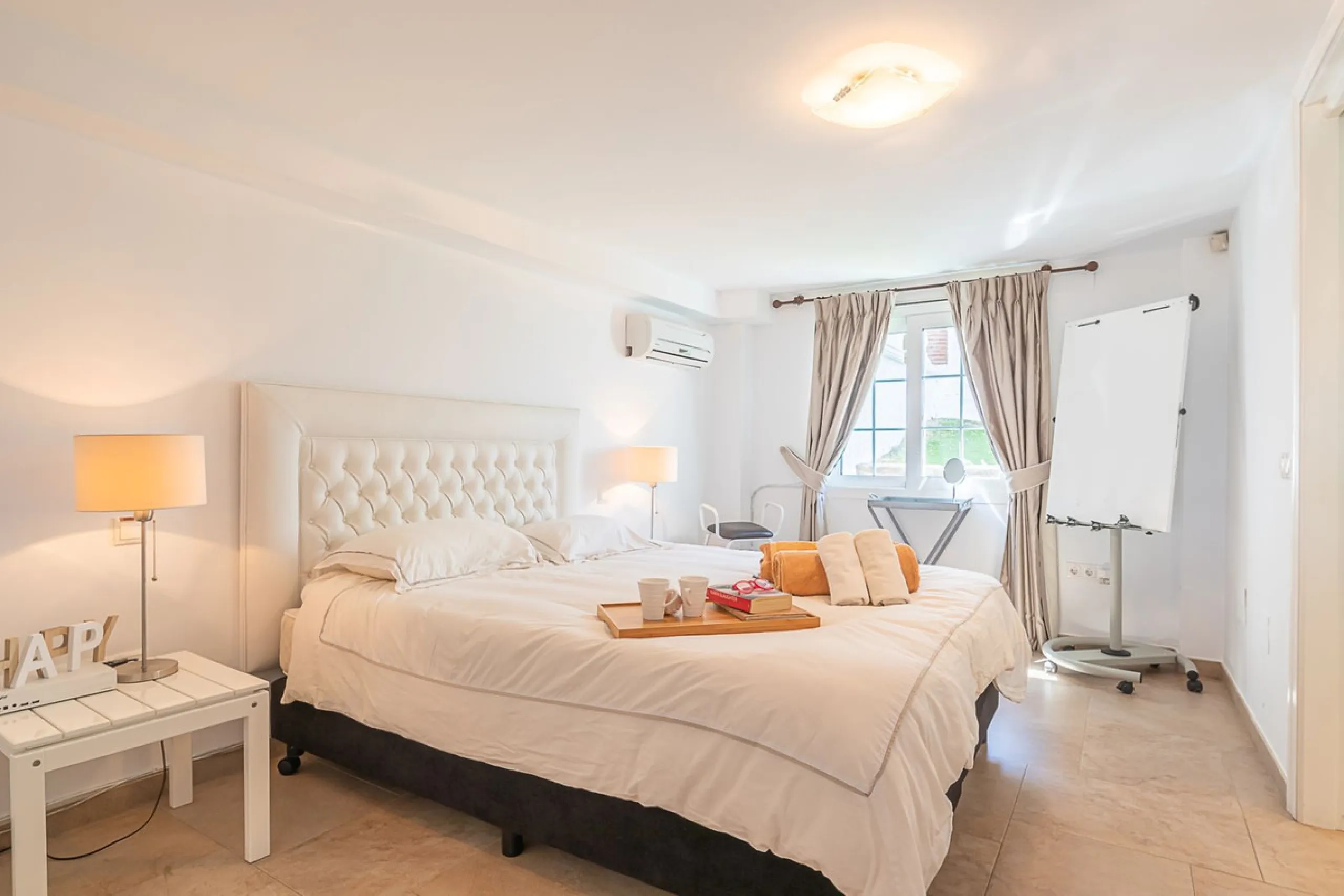 Nestled in the Urb. Torrenueva, Mijas Costa, this enchanting, six-bedroom villa, divided over two floors, epitomizes charm and elegance. Ideal for rental purposes to produce ROI or as a two family home. (Tourist Rental Licence in place). Located in the pi