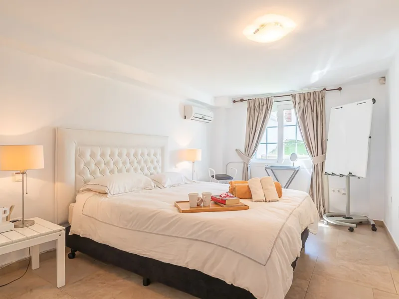 Nestled in the Urb. Torrenueva, Mijas Costa, this enchanting, six-bedroom villa, divided over two floors, epitomizes charm and elegance. Ideal for rental purposes to produce ROI or as a two family home. (Tourist Rental Licence in place). Located in the pi