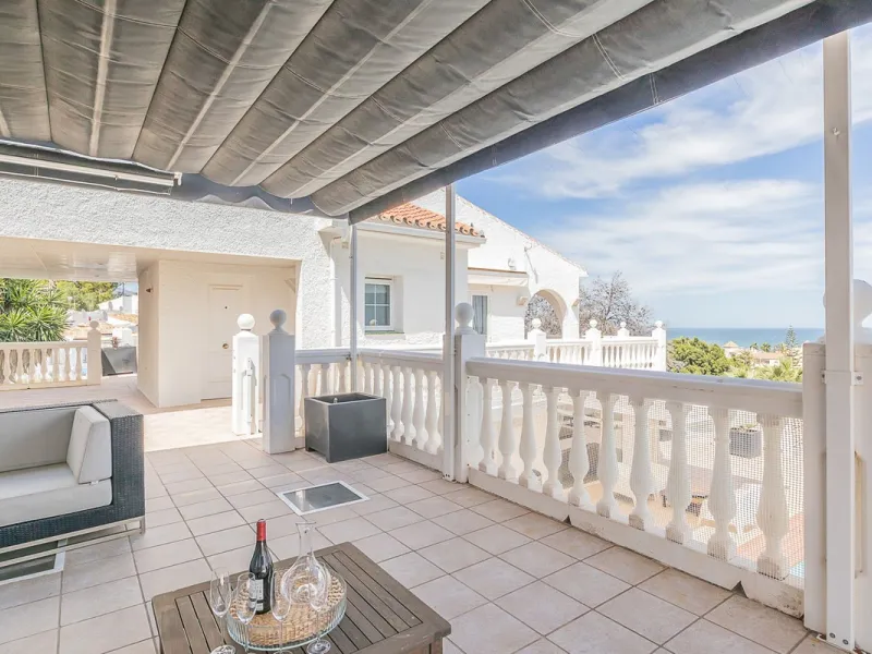 Nestled in the Urb. Torrenueva, Mijas Costa, this enchanting, six-bedroom villa, divided over two floors, epitomizes charm and elegance. Ideal for rental purposes to produce ROI or as a two family home. (Tourist Rental Licence in place). Located in the pi
