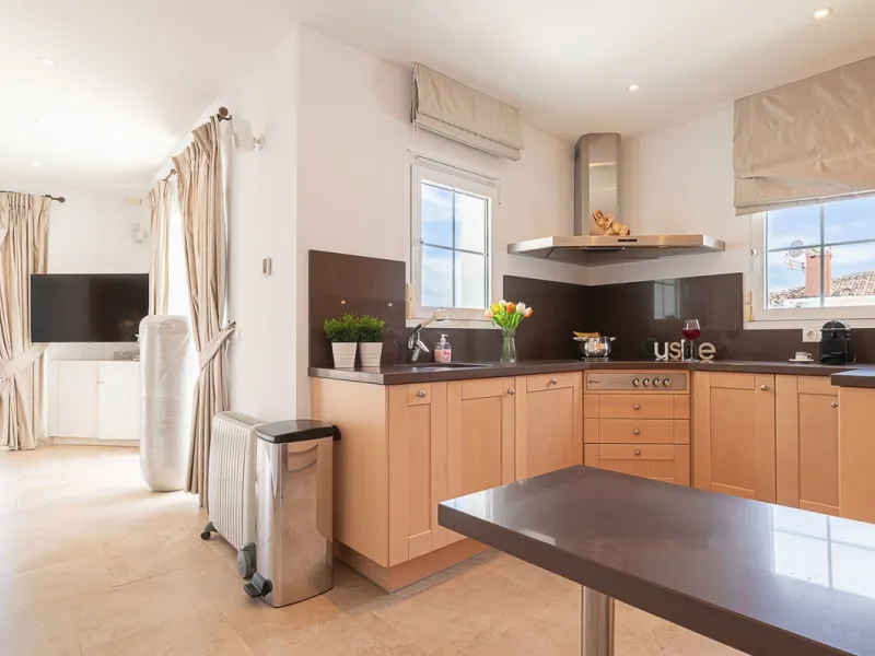 Nestled in the Urb. Torrenueva, Mijas Costa, this enchanting, six-bedroom villa, divided over two floors, epitomizes charm and elegance. Ideal for rental purposes to produce ROI or as a two family home. (Tourist Rental Licence in place). Located in the pi