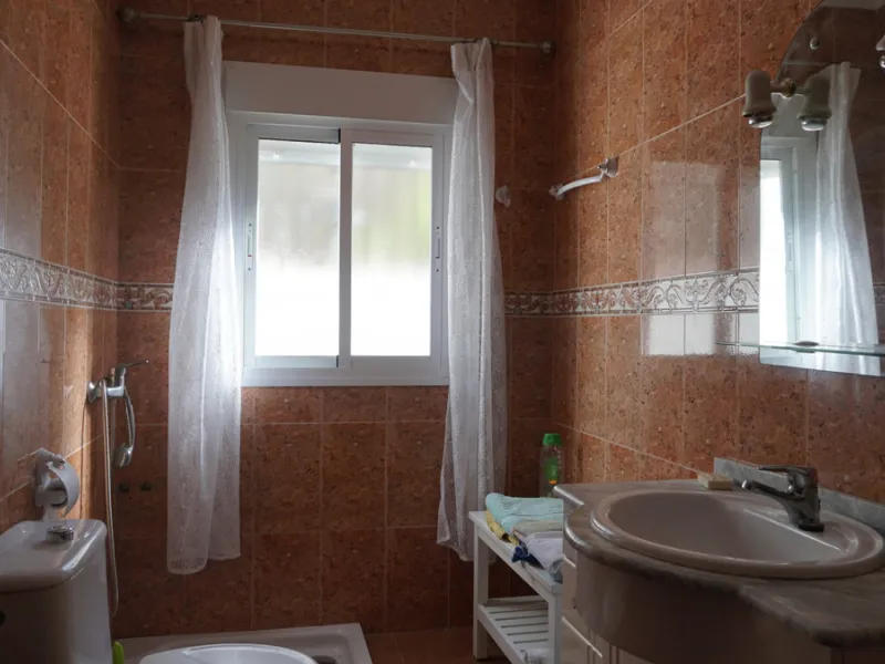 Indulge in the allure of rustic elegance with this enchanting country haven in Sayalonga. The carefully crafted 5-bedroom, 2-bathroom residence spans a generous 136m2, seamlessly blending modern comfort with timeless charm. Built in 2006, the home exudes 