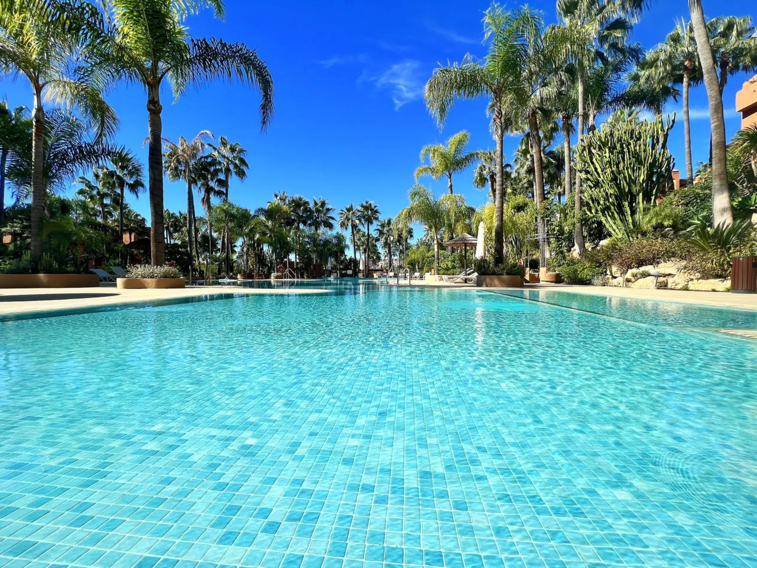"A three bedroom duplex penthouse in La Alzambra Hill Club, a 24hr gated and secure development, set on lush tropical gardens with waterfalls, communal swimming pool and a gymnasium.