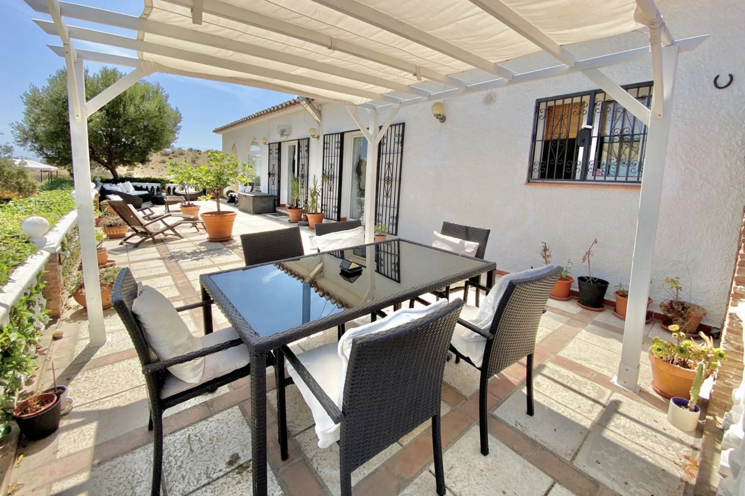 REDUCED - Beautiful 4 bed hillside villa with large swimming pool on elevated 3000 m2 plot just 7 mins above popular "La Cala de Mijas" blue flag beaches. Offering privacy & stunning panoramic sea, mountain & country views.