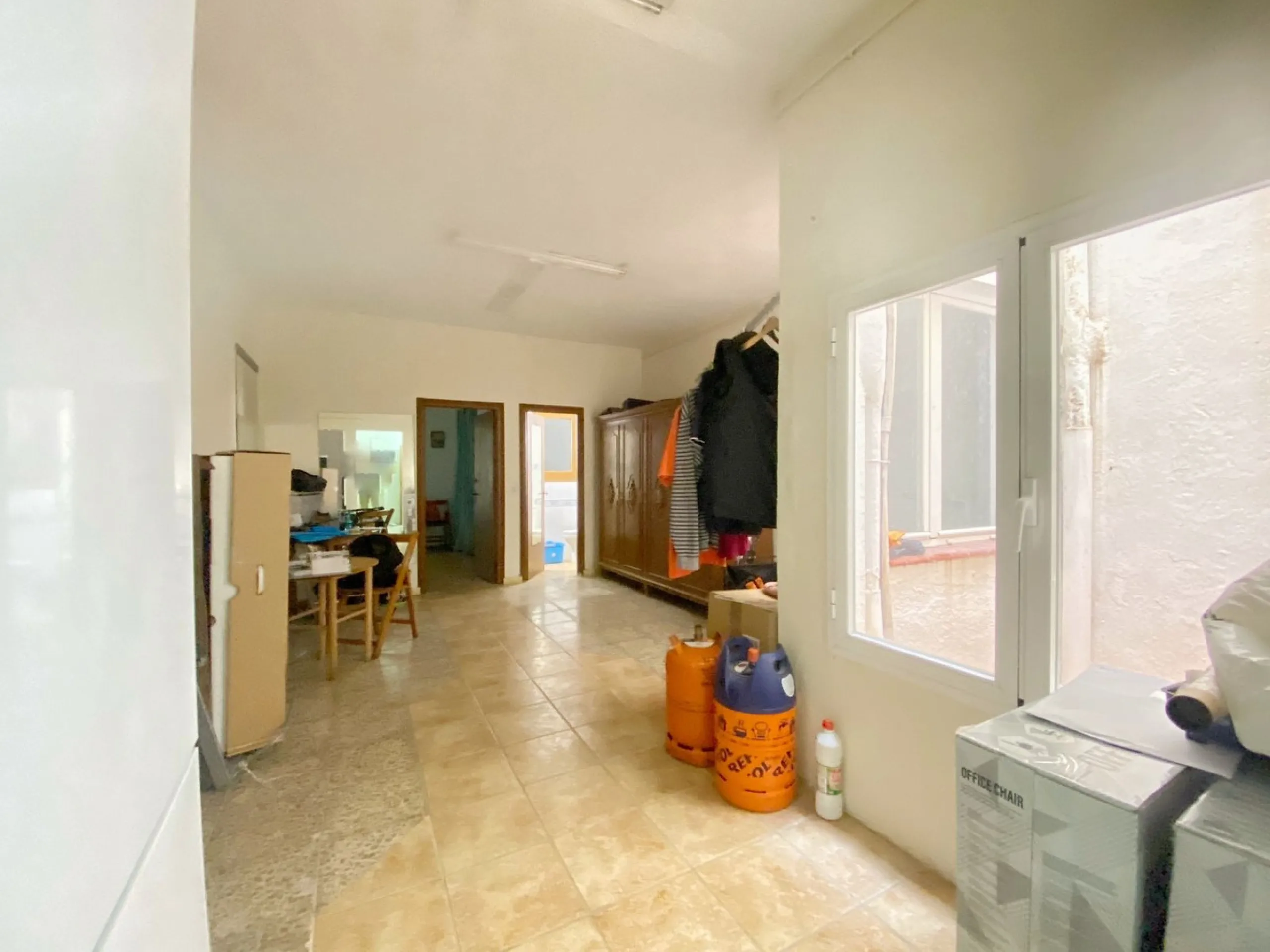 Spacious  town house with an interior patio and several rooms distributed between the two main floors.