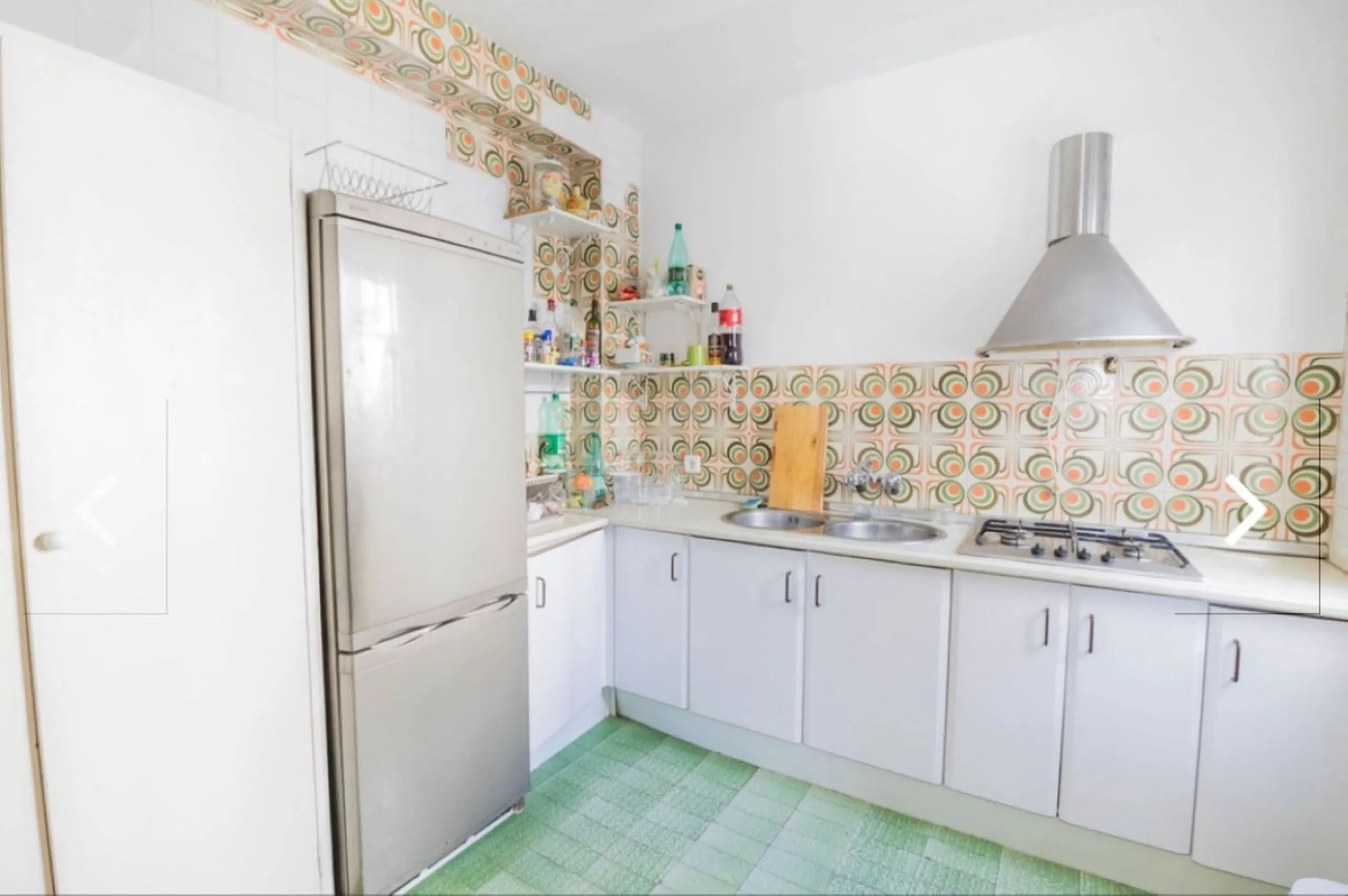 Spacious  town house with an interior patio and several rooms distributed between the two main floors.