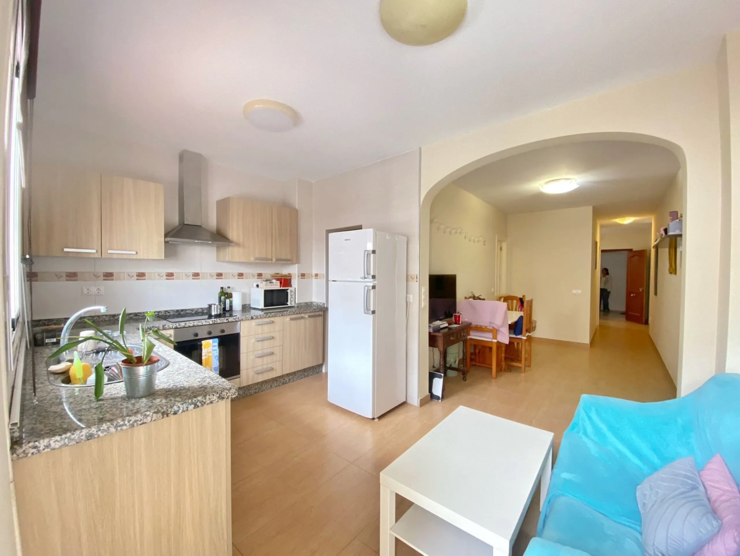 Spacious  town house with an interior patio and several rooms distributed between the two main floors.