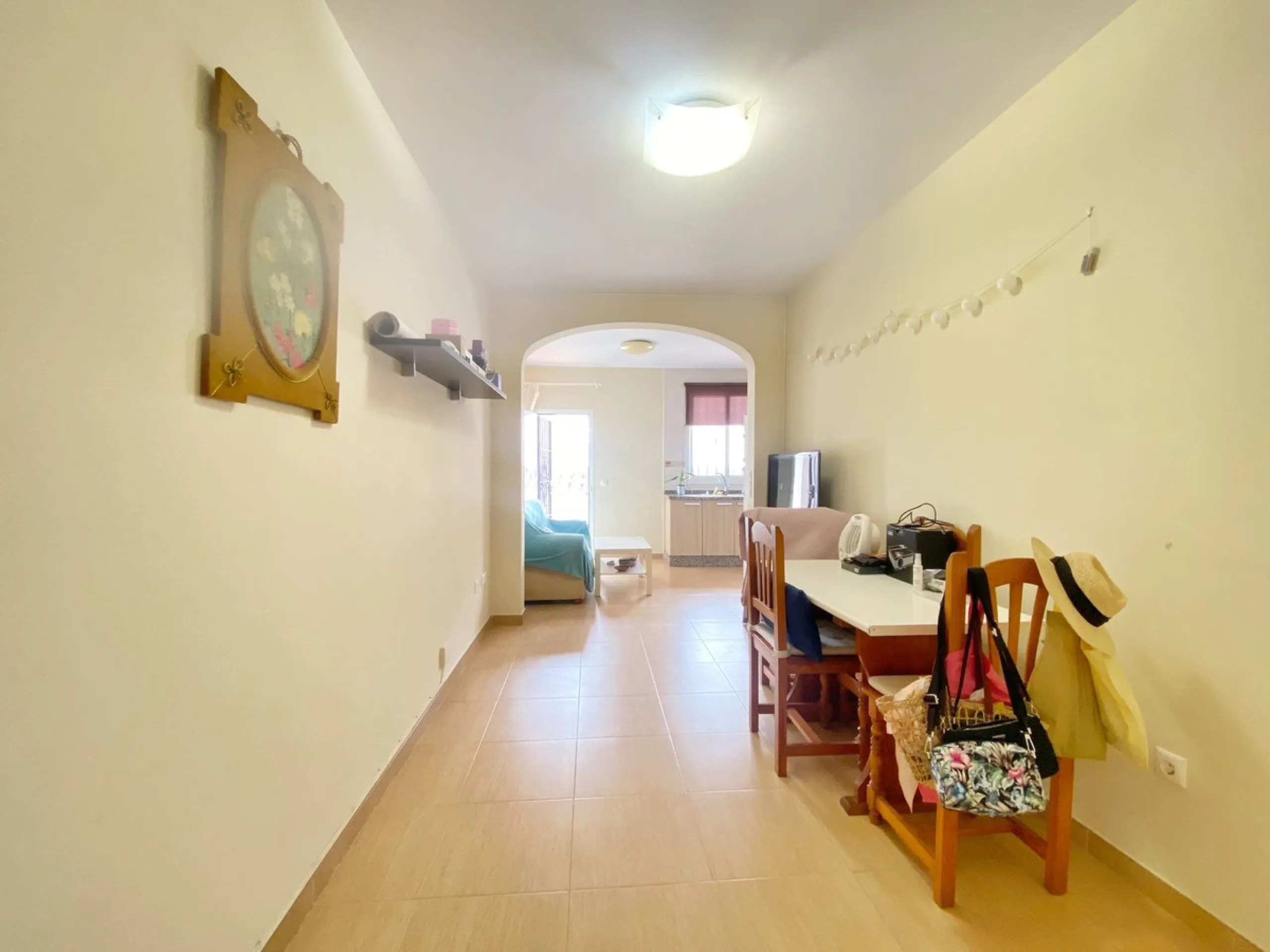 Spacious  town house with an interior patio and several rooms distributed between the two main floors.