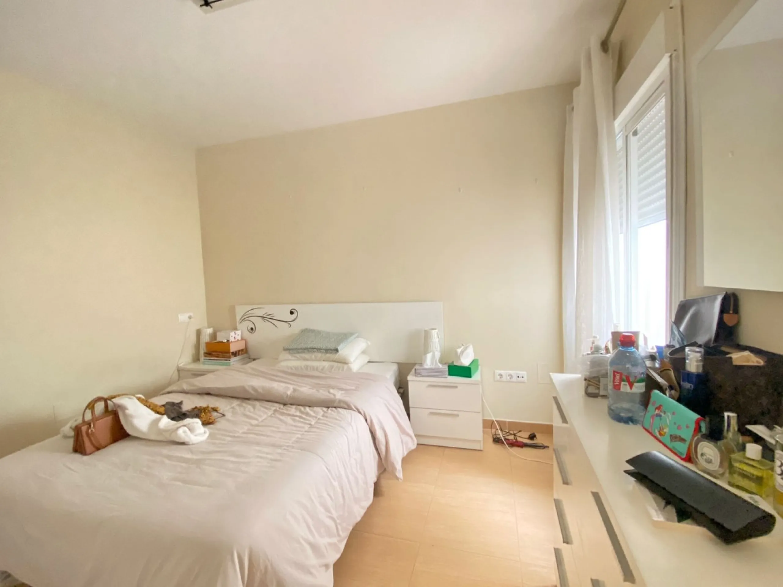 Spacious  town house with an interior patio and several rooms distributed between the two main floors.