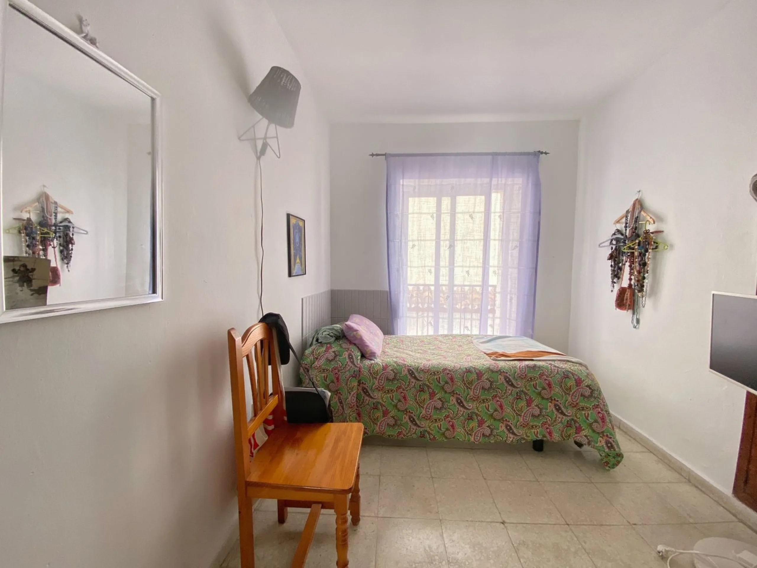 Spacious  town house with an interior patio and several rooms distributed between the two main floors.