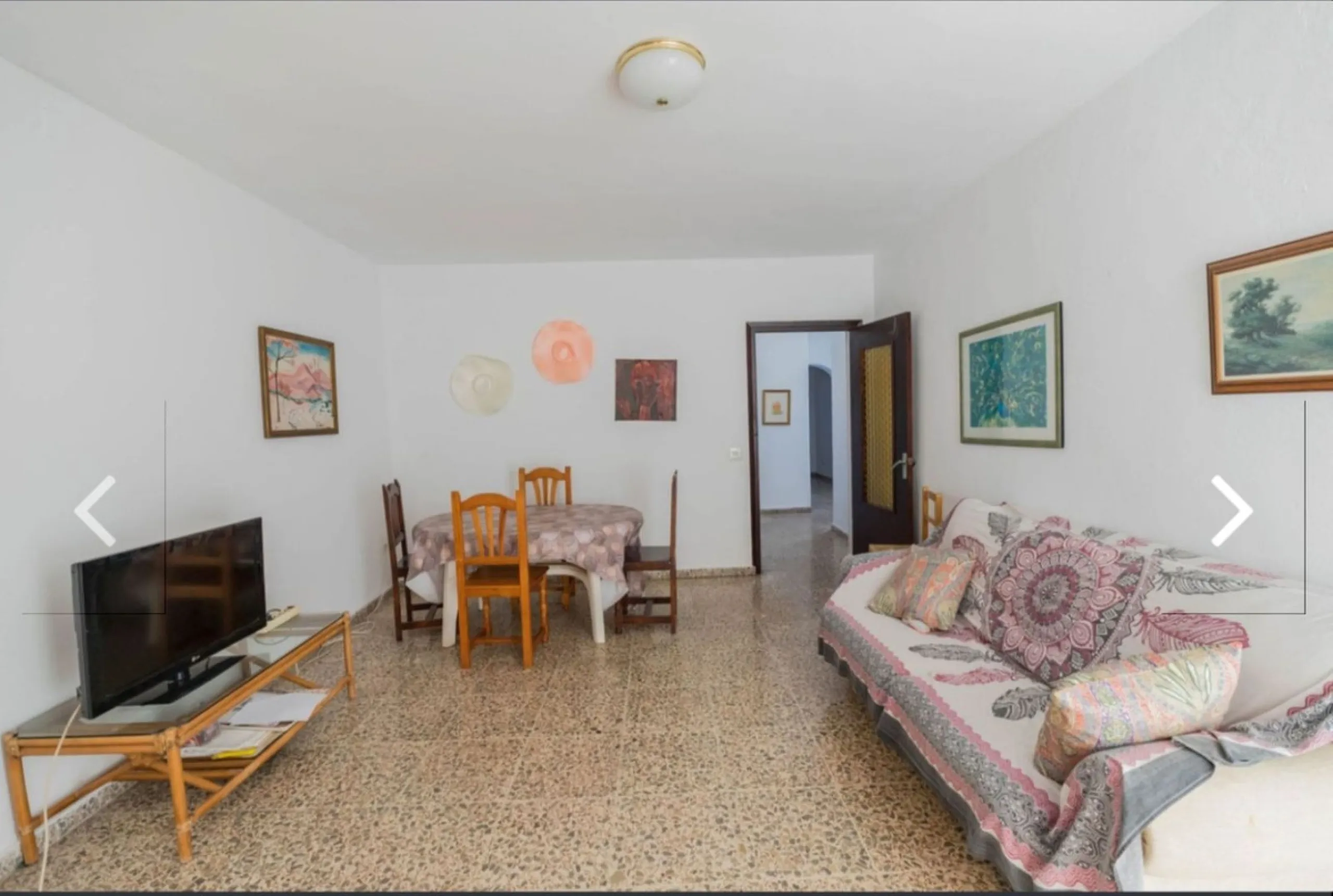Spacious  town house with an interior patio and several rooms distributed between the two main floors.