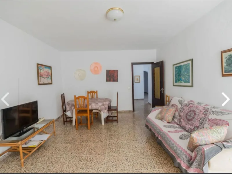 Spacious  town house with an interior patio and several rooms distributed between the two main floors.