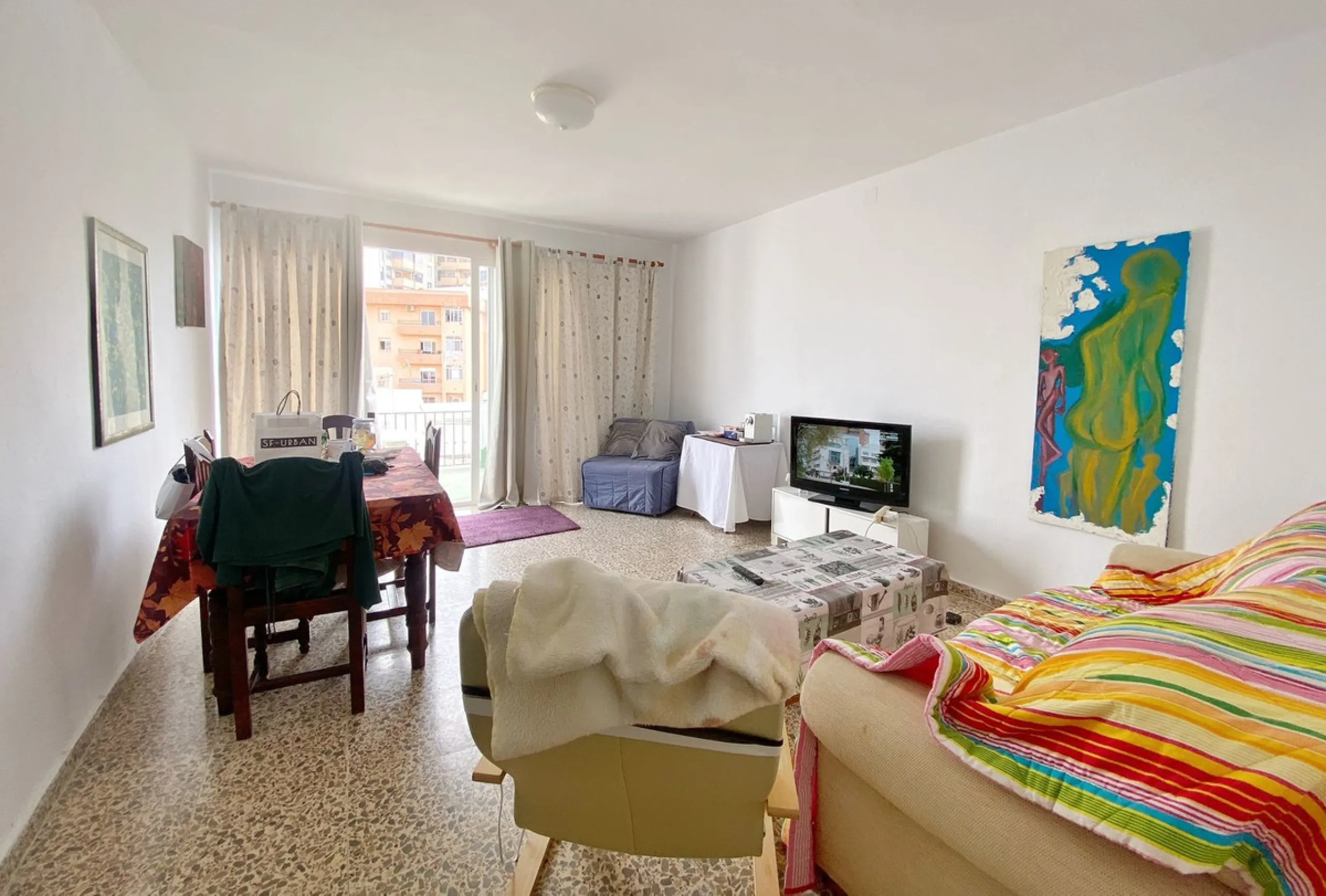 Spacious  town house with an interior patio and several rooms distributed between the two main floors.