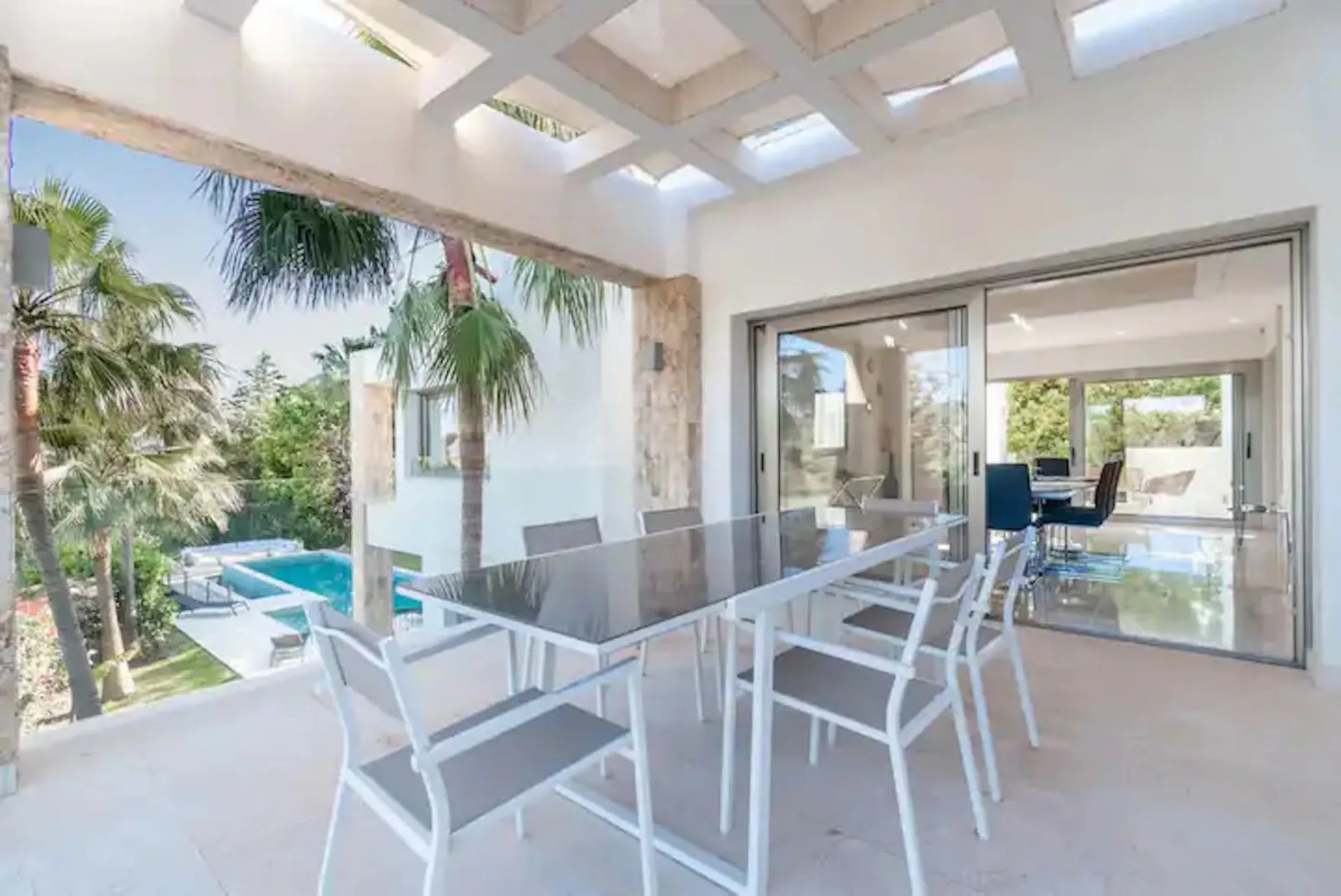 This magnificent villa is an open plan one, and the ground floor flows into the terrace and the garden with lovely sea views and a vast infinity pool, leading to a chill-out area with a fireplace. The villa has ensuite bedrooms on each floor, which gives 