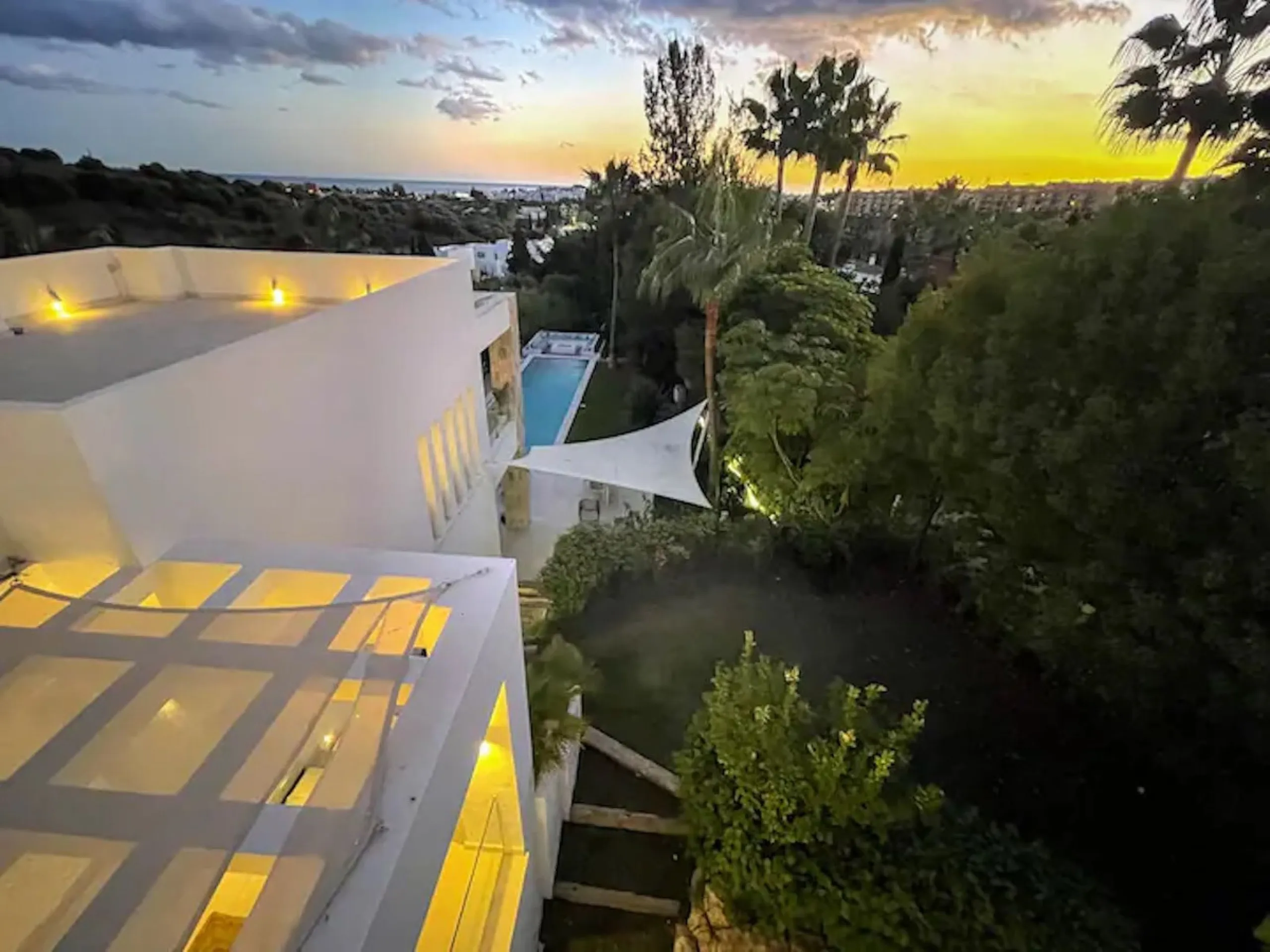 This magnificent villa is an open plan one, and the ground floor flows into the terrace and the garden with lovely sea views and a vast infinity pool, leading to a chill-out area with a fireplace. The villa has ensuite bedrooms on each floor, which gives 