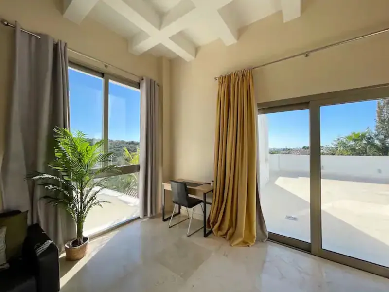 This magnificent villa is an open plan one, and the ground floor flows into the terrace and the garden with lovely sea views and a vast infinity pool, leading to a chill-out area with a fireplace. The villa has ensuite bedrooms on each floor, which gives 