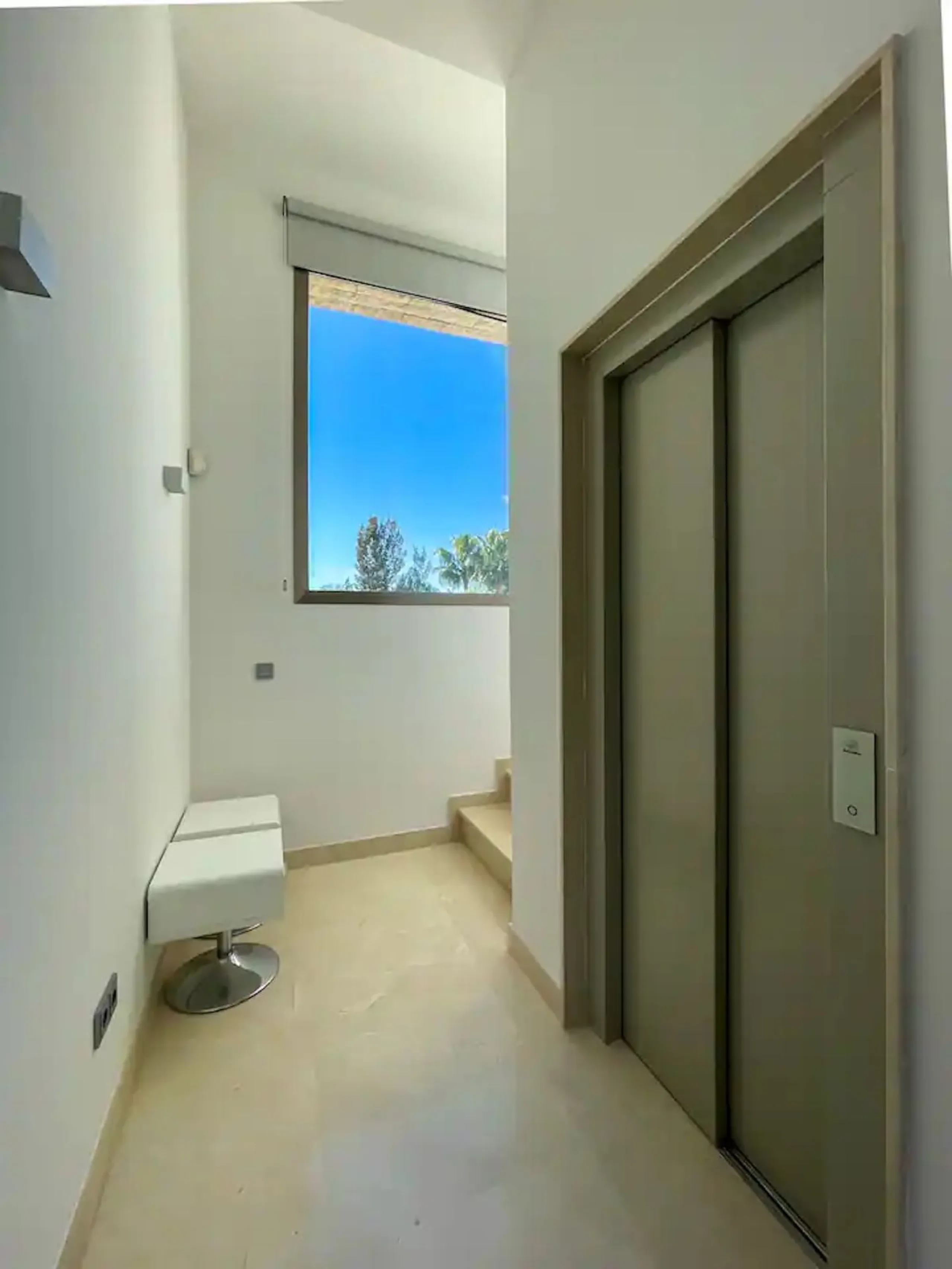 This magnificent villa is an open plan one, and the ground floor flows into the terrace and the garden with lovely sea views and a vast infinity pool, leading to a chill-out area with a fireplace. The villa has ensuite bedrooms on each floor, which gives 