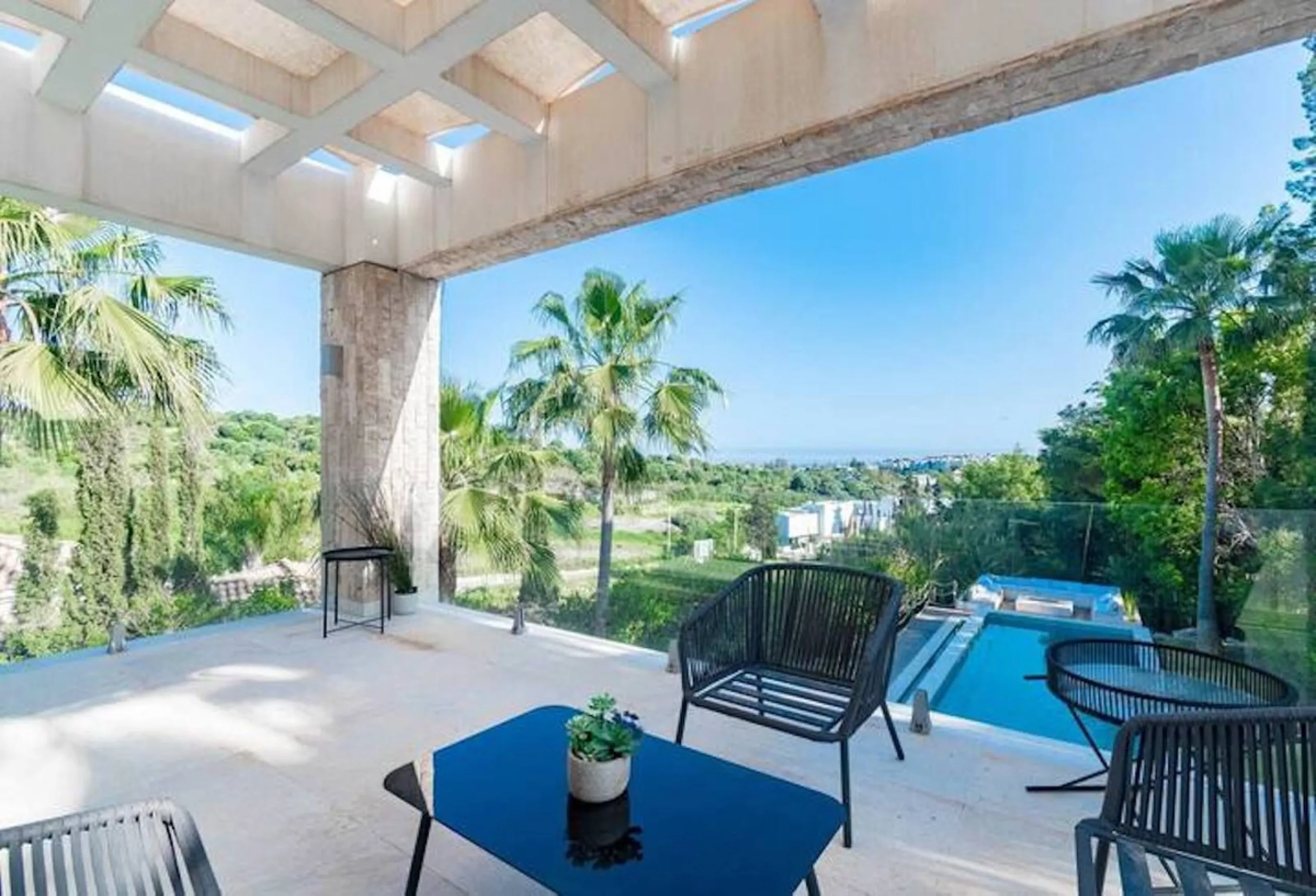 This magnificent villa is an open plan one, and the ground floor flows into the terrace and the garden with lovely sea views and a vast infinity pool, leading to a chill-out area with a fireplace. The villa has ensuite bedrooms on each floor, which gives 