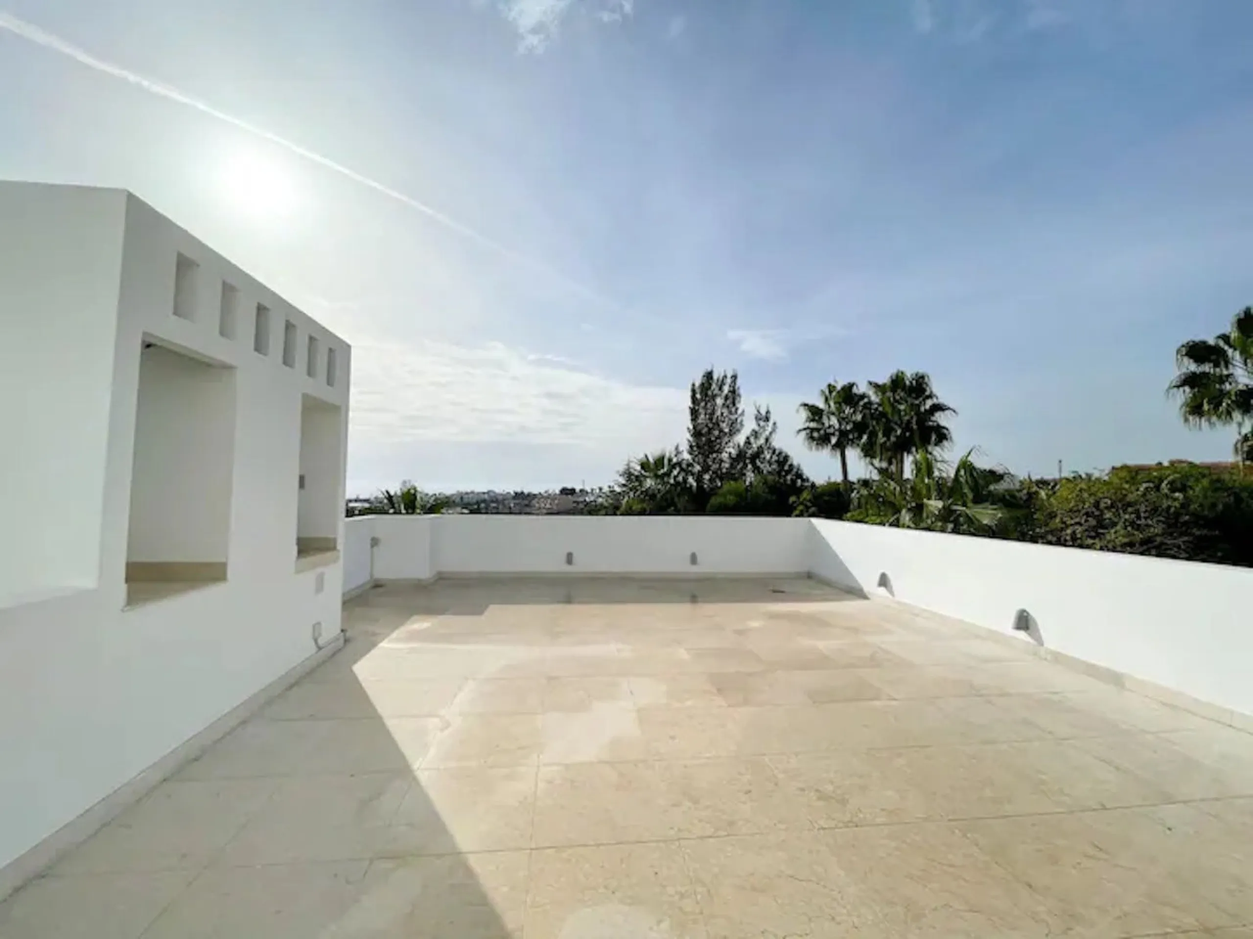 This magnificent villa is an open plan one, and the ground floor flows into the terrace and the garden with lovely sea views and a vast infinity pool, leading to a chill-out area with a fireplace. The villa has ensuite bedrooms on each floor, which gives 