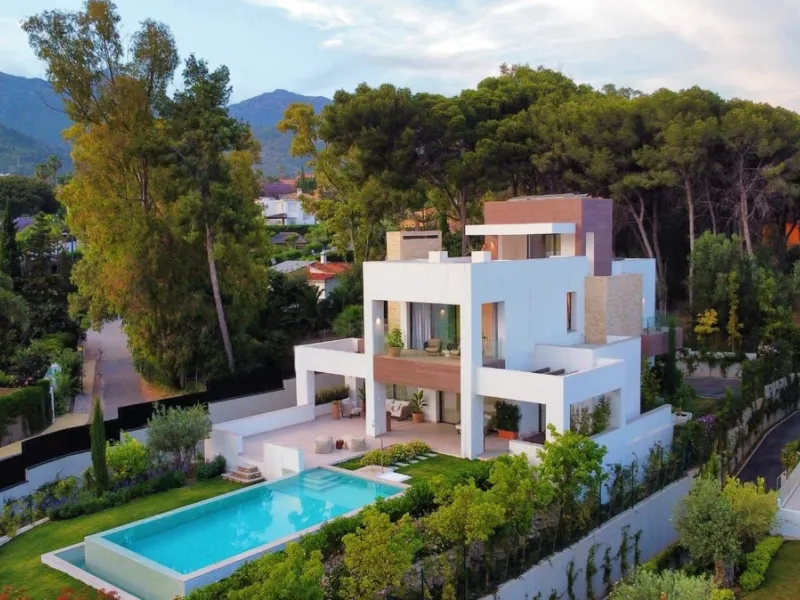 Modern luxury villa of exceptional qualities is located in a gated community, consisting of only 12 villas, with 24 hour security guards and concierge services situated in a green oasis on the edge of the famous Golden Mile and just a few metres from the 