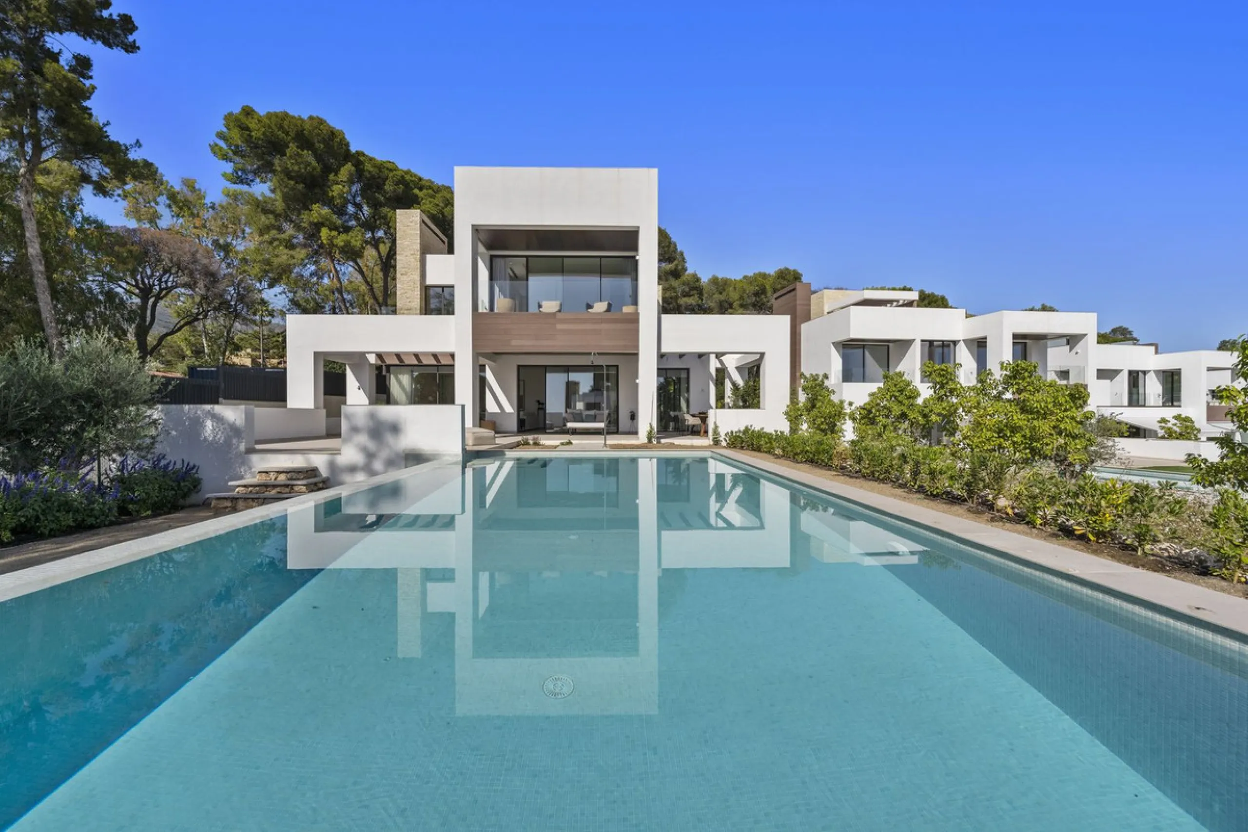 Modern luxury villa of exceptional qualities is located in a gated community, consisting of only 12 villas, with 24 hour security guards and concierge services situated in a green oasis on the edge of the famous Golden Mile and just a few metres from the 