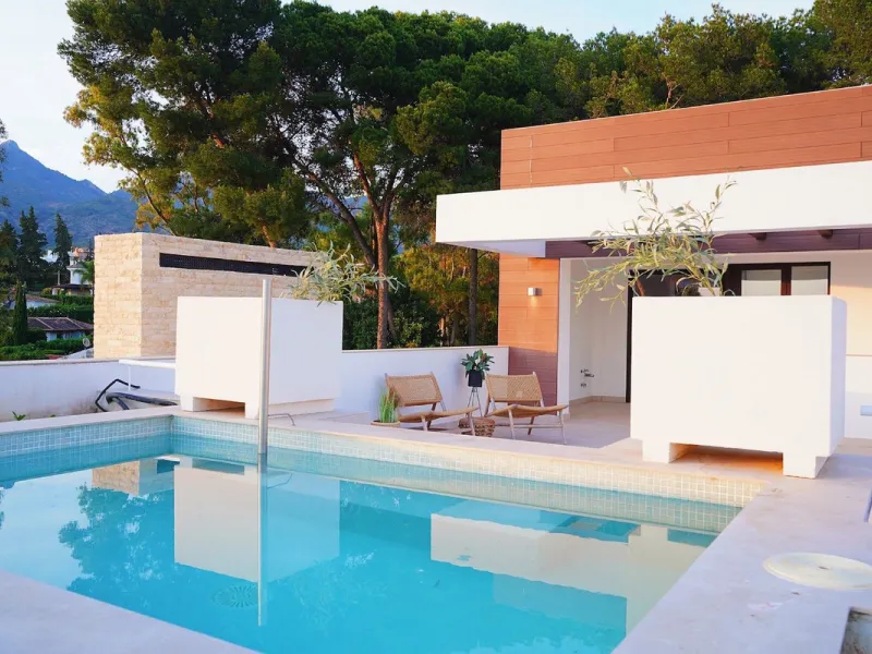 Modern luxury villa of exceptional qualities is located in a gated community, consisting of only 12 villas, with 24 hour security guards and concierge services situated in a green oasis on the edge of the famous Golden Mile and just a few metres from the 