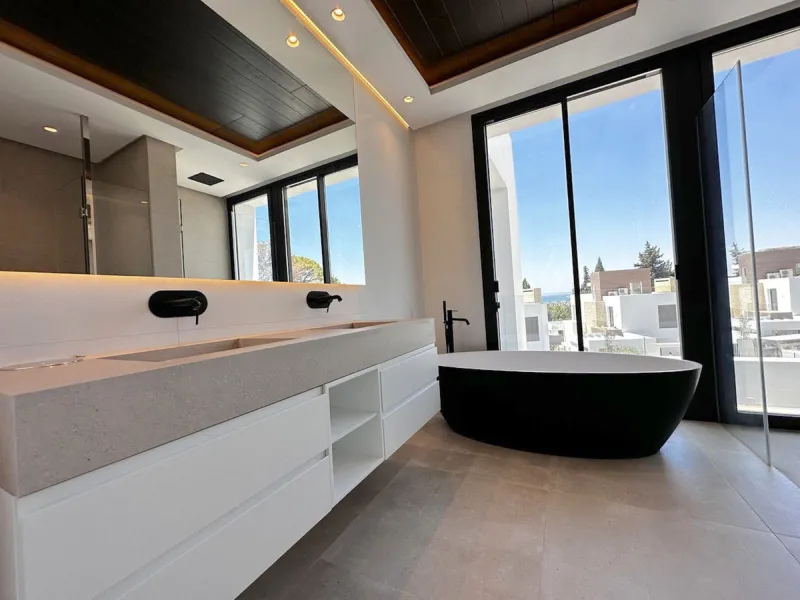 Modern luxury villa of exceptional qualities is located in a gated community, consisting of only 12 villas, with 24 hour security guards and concierge services situated in a green oasis on the edge of the famous Golden Mile and just a few metres from the 