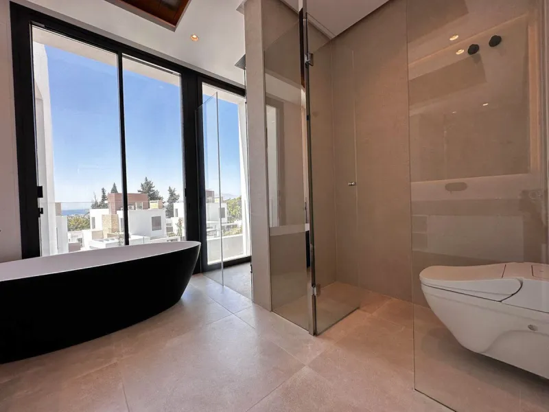 Modern luxury villa of exceptional qualities is located in a gated community, consisting of only 12 villas, with 24 hour security guards and concierge services situated in a green oasis on the edge of the famous Golden Mile and just a few metres from the 