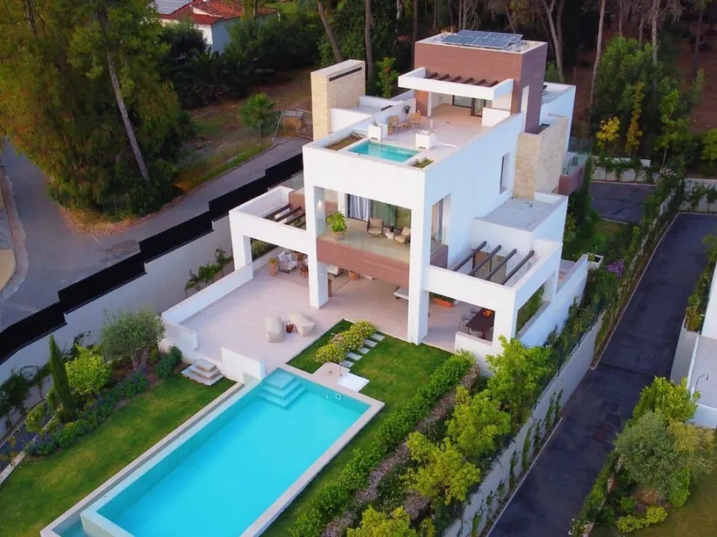 Modern luxury villa of exceptional qualities is located in a gated community, consisting of only 12 villas, with 24 hour security guards and concierge services situated in a green oasis on the edge of the famous Golden Mile and just a few metres from the 