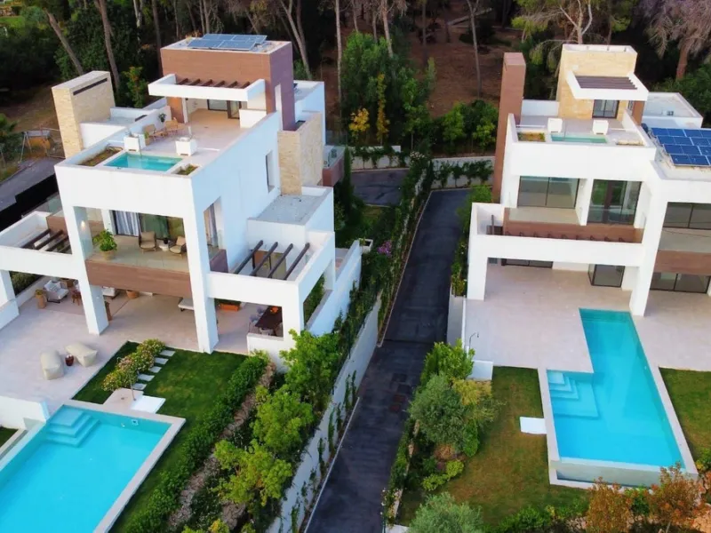 Modern luxury villa of exceptional qualities is located in a gated community, consisting of only 12 villas, with 24 hour security guards and concierge services situated in a green oasis on the edge of the famous Golden Mile and just a few metres from the 