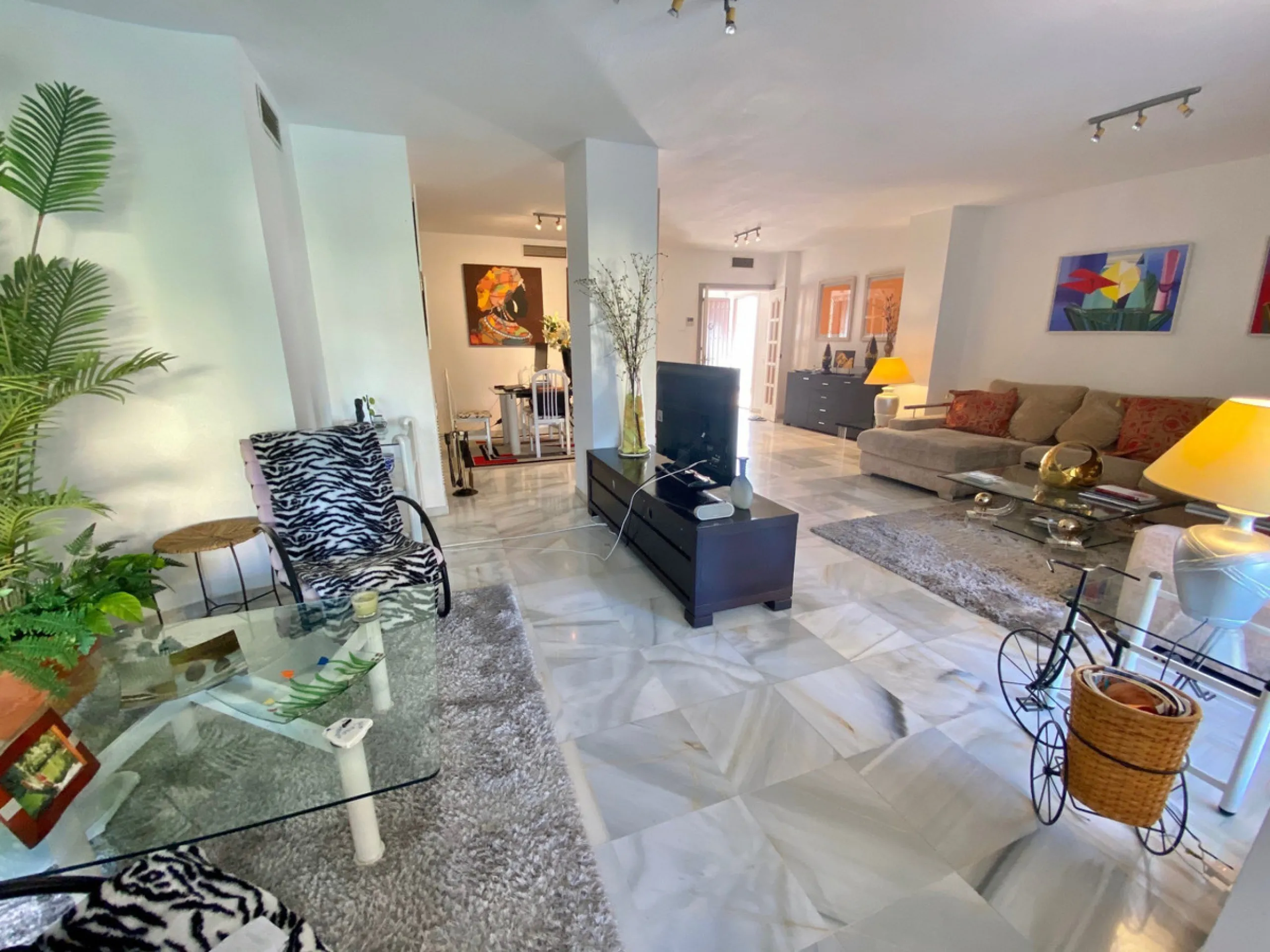 This impressive apartment is situated in the prestigious Nagüeles area on the renowned Marbella Golden Mile, offering a prime location in Marbella, Malaga. The property provides convenient access to a range of amenities and is ideally positioned near tran