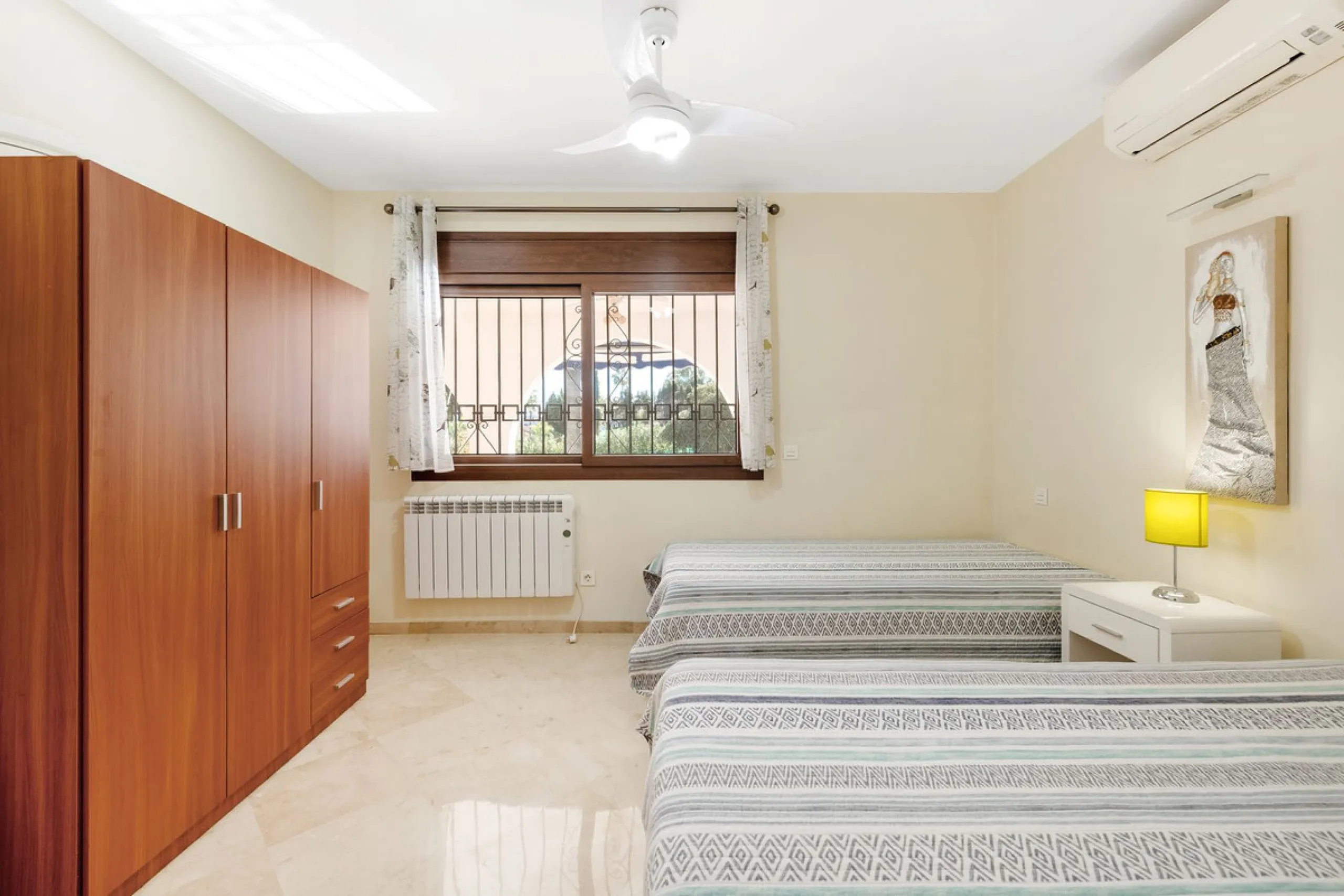 Villa "Casa Nina" is a characteristic Andalucian style modernised house, beautifully set in a tranquil location of Atalaya Alta, on the border between Estepona and Marbella - west of the enchanting Marbella city centre (10 min drive), and just a 5 minute 