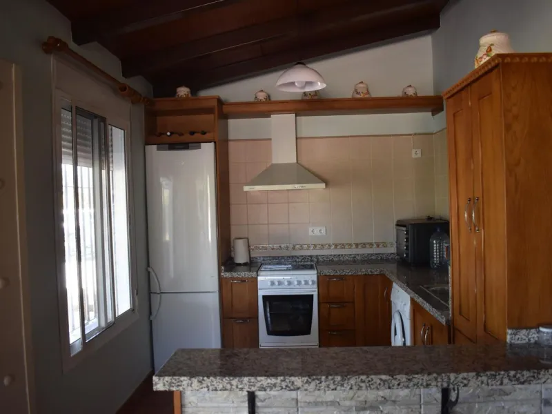 Country house located on the outskirts of Alhaurin el Grande with a plot of more than 14,000m2 ideal for horse lovers. The house is on one floor and consists of a large front porch as well as a rear porch towards the pool area which is surrounded by a lar