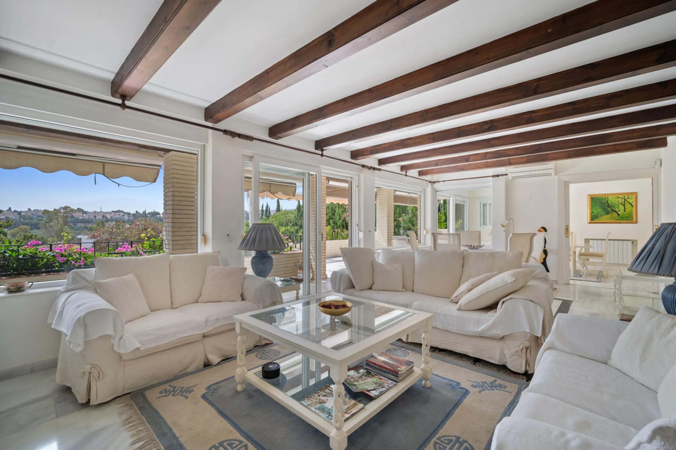 This villa is nestled in an elevated position within the urbanisation of Guadalmina Alta, a beautiful and well-established urbanisation known for its quality living.  This villa boasts stunning panoramic views due to its well-designed elevated position on