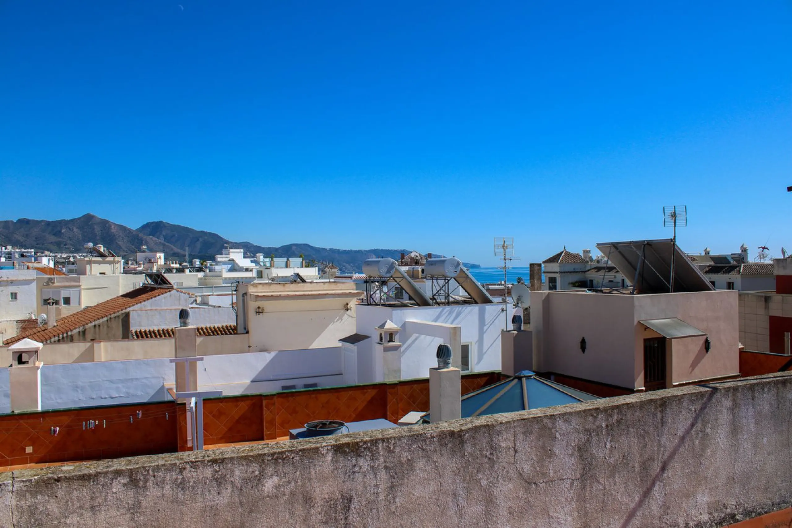 UNIQUE INVESTMENT OPPORTUNITY, property in the center of Nerja with three apartments and tourist license.