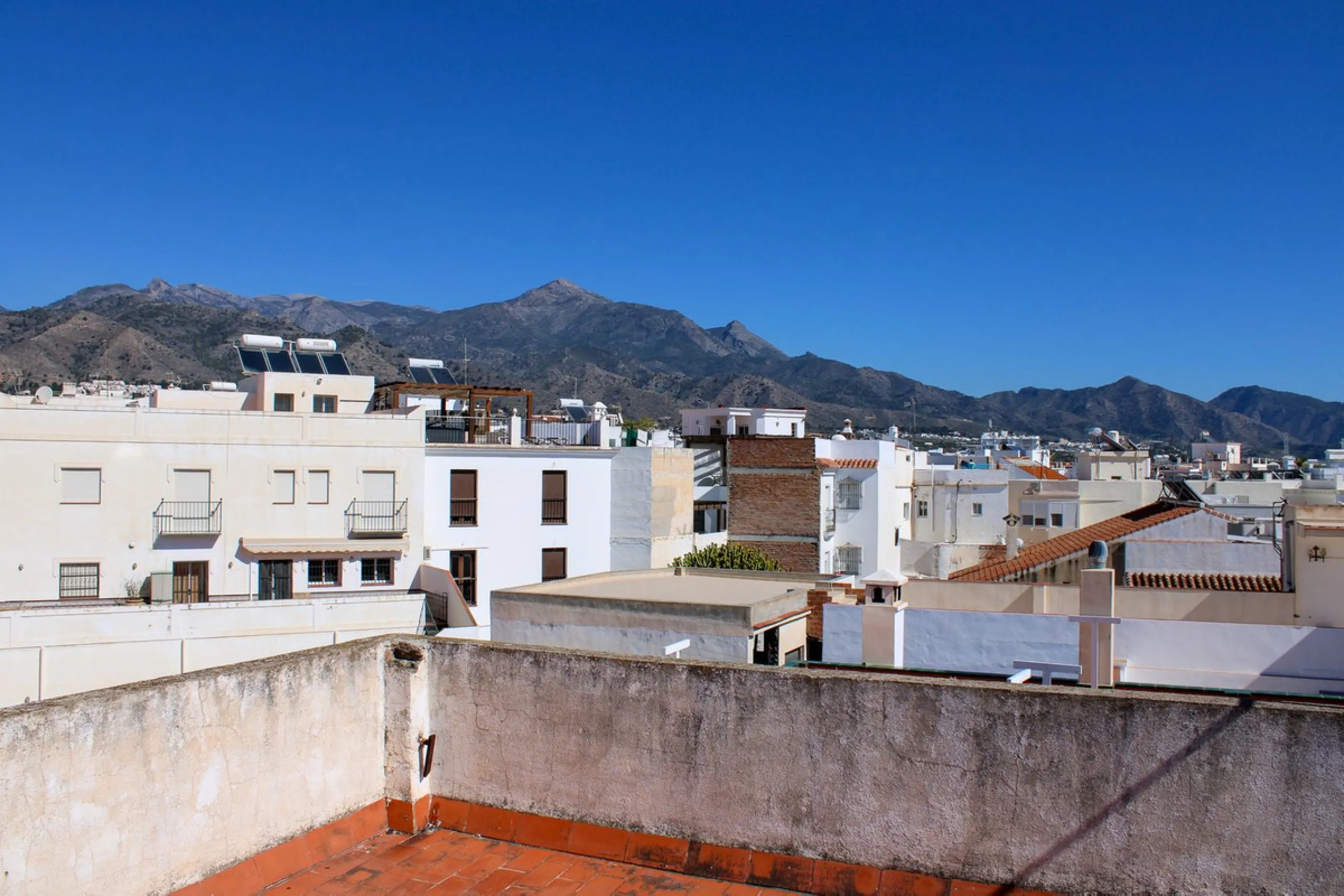 UNIQUE INVESTMENT OPPORTUNITY, property in the center of Nerja with three apartments and tourist license.