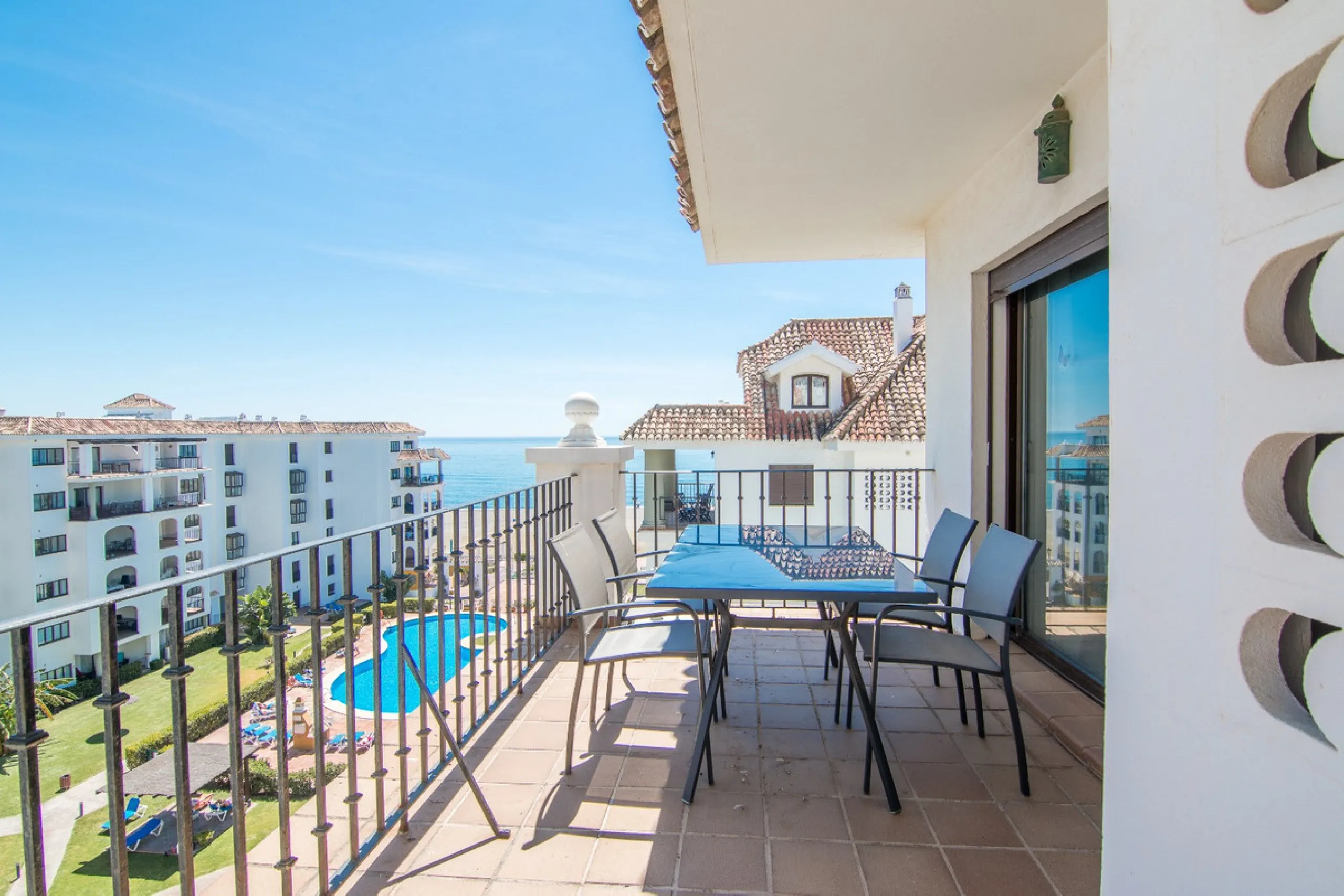 This exceptional two-bedroom, two-bathroom apartment is perfectly positioned on the front line of the beach in the sought-after area of Puerto La Duquesa, Manilva, Malaga. Offering a harmonious blend of comfort, style, and convenience, the property stands